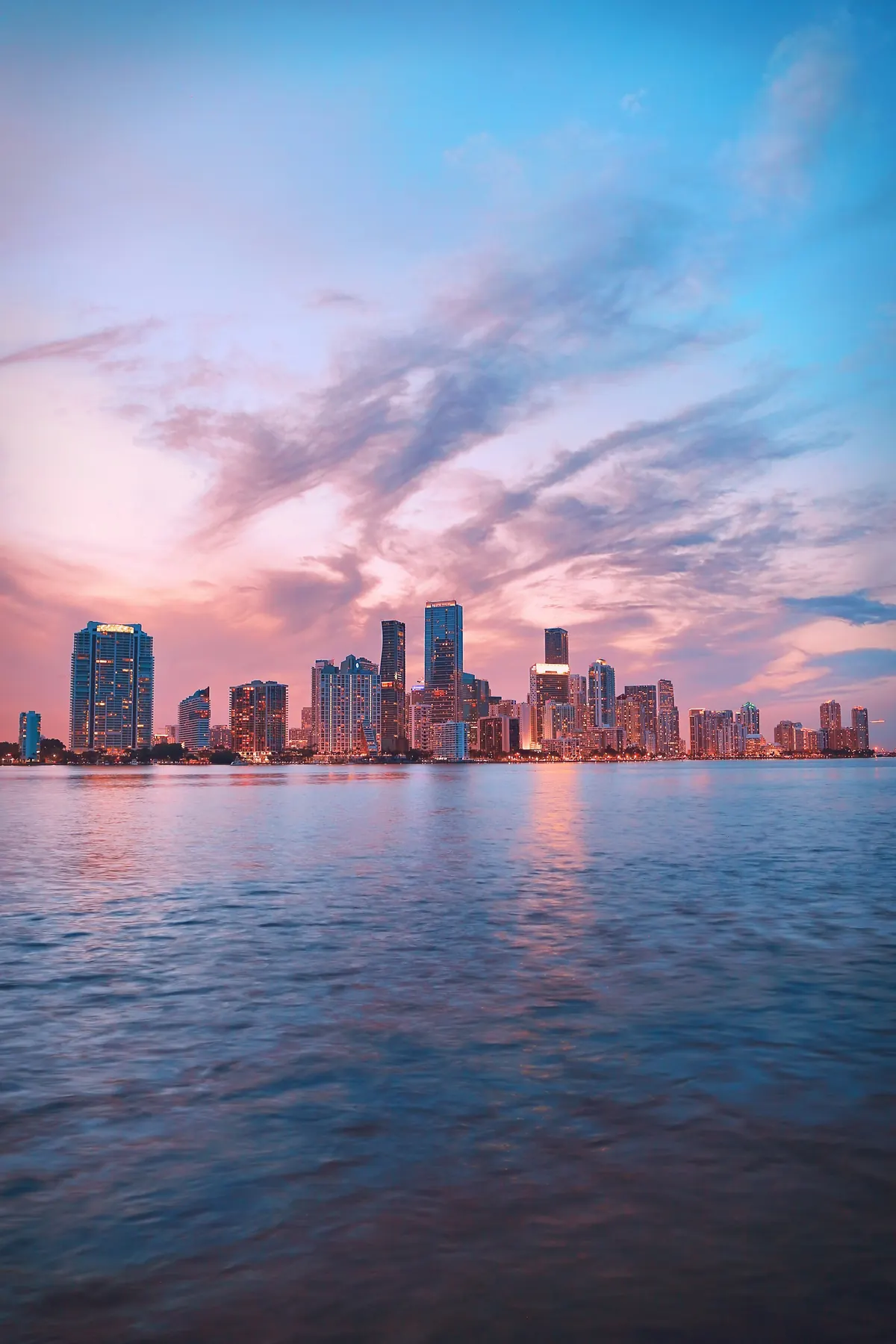 Miami skyline reflected in the bay at sunset