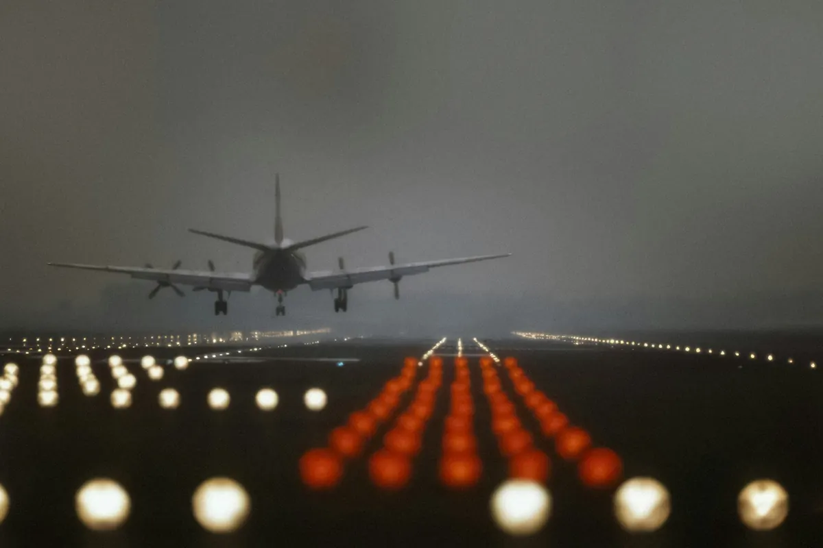 Runway edge lights glowing at night